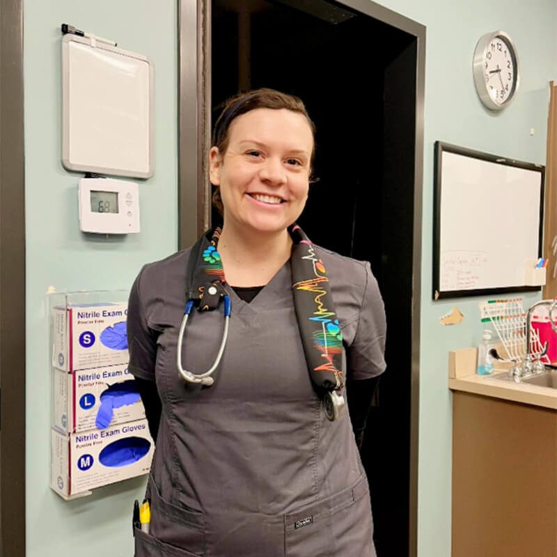 female vet smiling for camera
